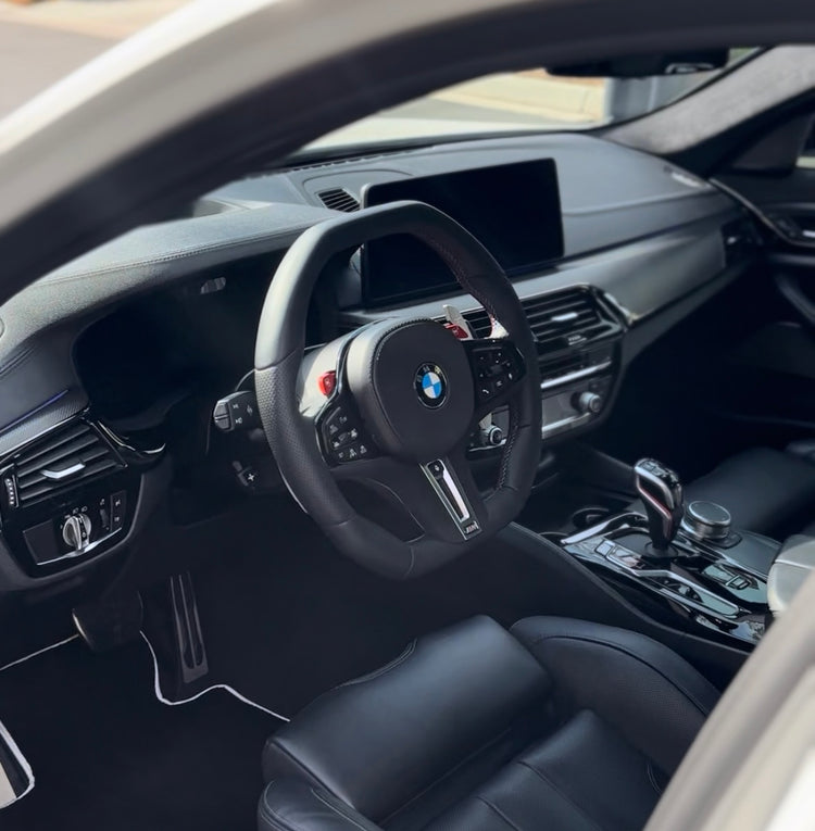 Detailed BMW interior with clean leather seats