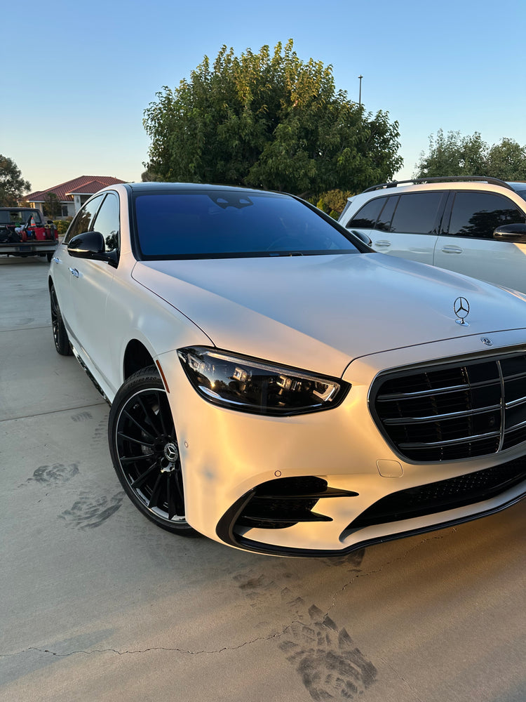 White Mercedes S-Class with a freshly sealed finish